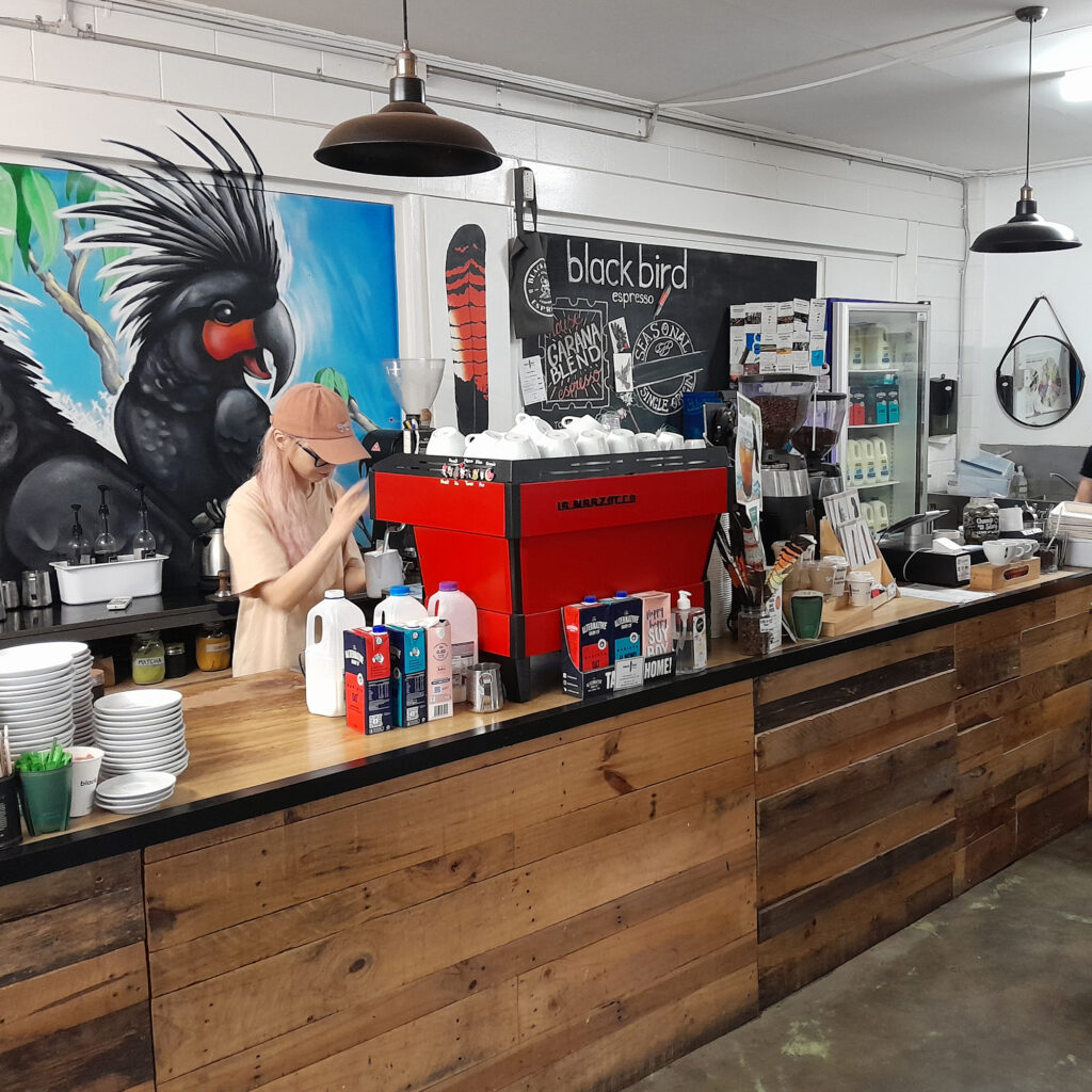 Snowie working her magic on the La Marzocco machine at Blackbird Laneway in Cairns